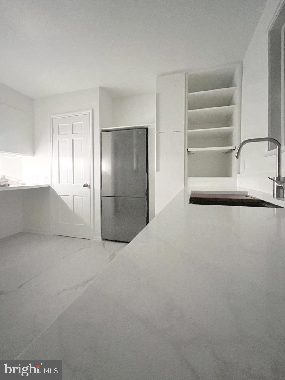 5507 Chesterbrook Road Bethesda, MD 20816 - Photo 5 of 24 a view of empty room with wooden floor