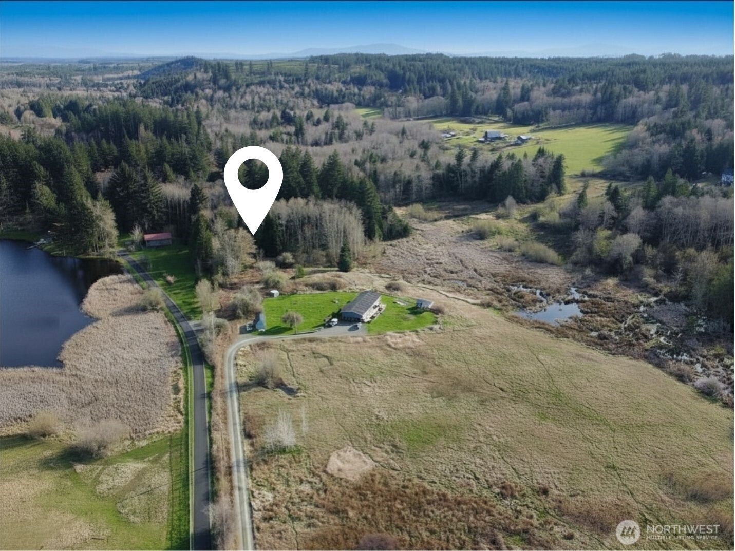 -xxx Embody Road Port Ludlow, WA 98365 - Photo 2 of 26 a aerial view of a house with a yard