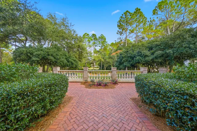 a view of a pathway with a park