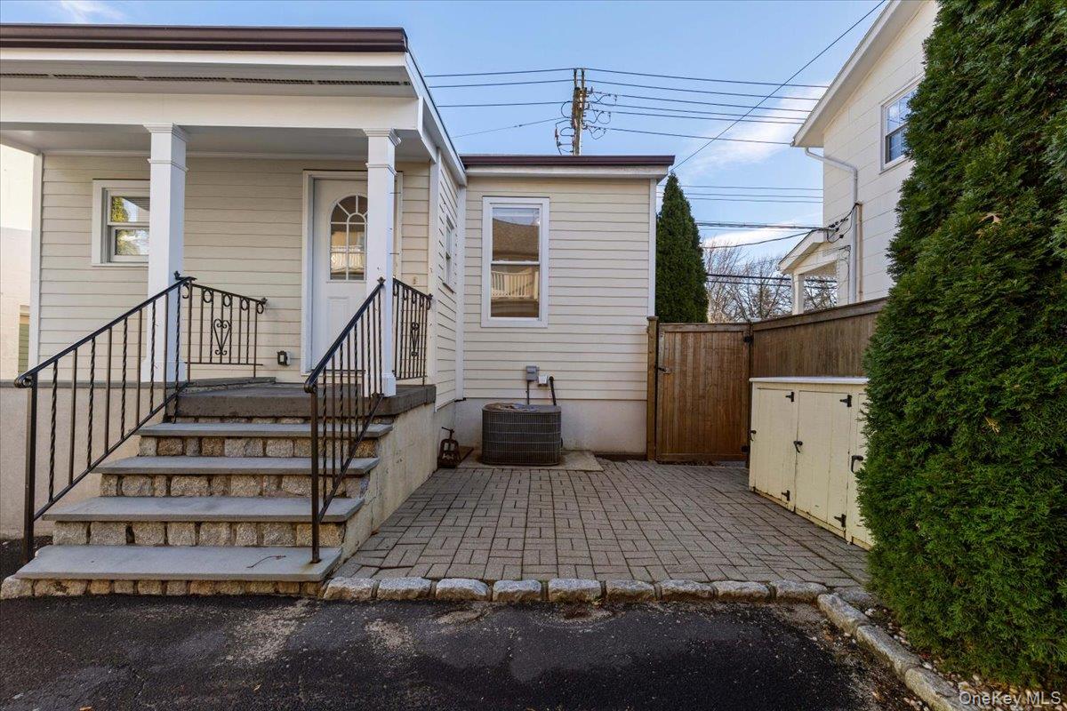 397 Midland Avenue, Unit 397 Rye, NY 10580 - Photo 13 of 16 a view of a house with entryway and stairs