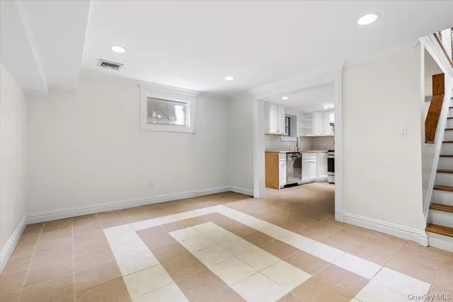 a view of a kitchen with furniture and a kitchen