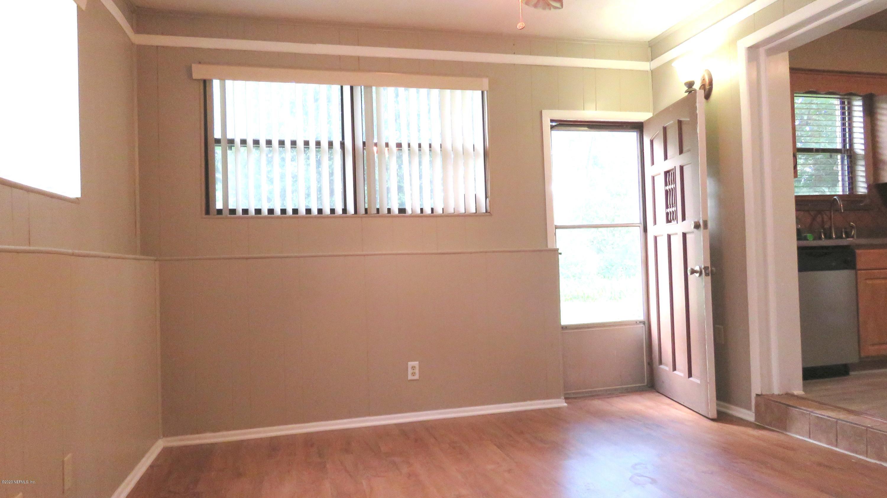 4715 Spring Park Road Jacksonville, FL 32207 - Photo 10 of 12 a view of an empty room with a window