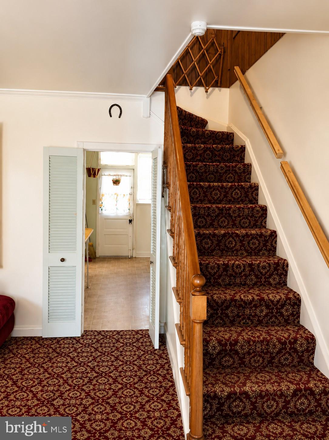 1547 Lochwood Road Baltimore, MD 21218 - Photo 19 of 30 Wooden Staircase leading to Three Bedrooms