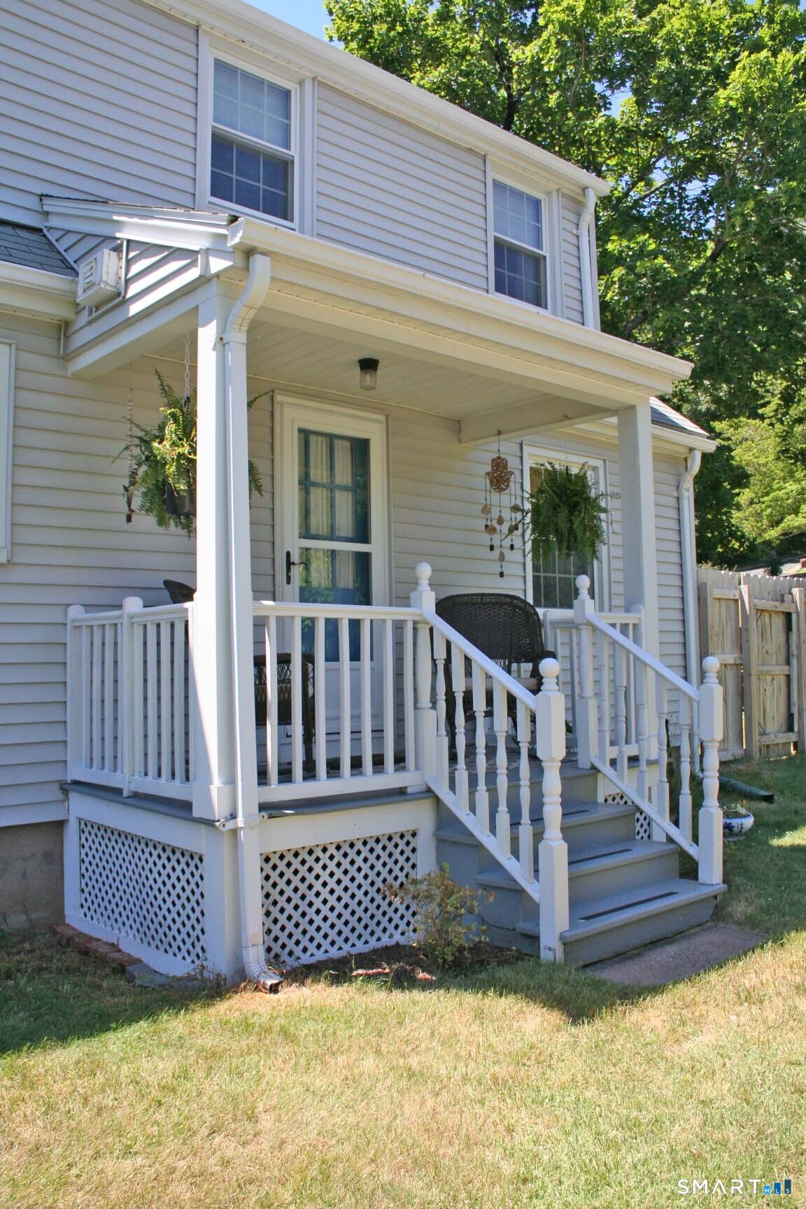 65 Prout Hill Road Middletown, CT 06457 - Photo 27 of 31 The covered rear porch is a great place to sit and appreciate the backyard