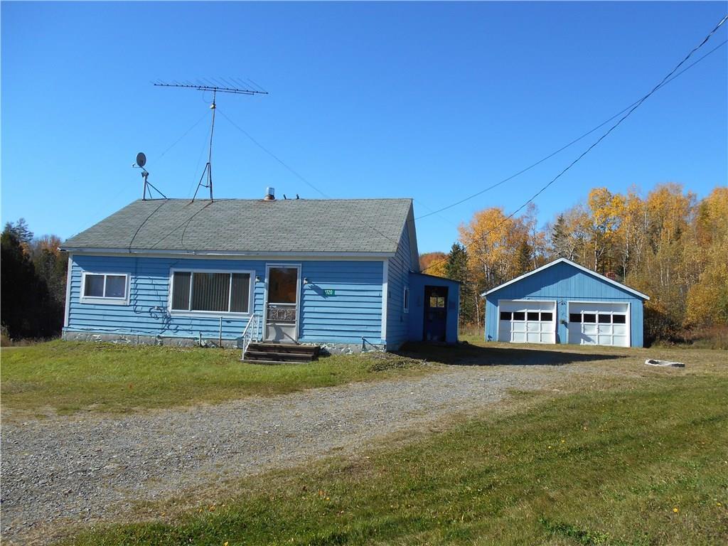 1720 Route Orient Me 04471, Unit 1 Orient, ME 04471 - Photo 1 of 12 Front of home and 2 bay garage that...