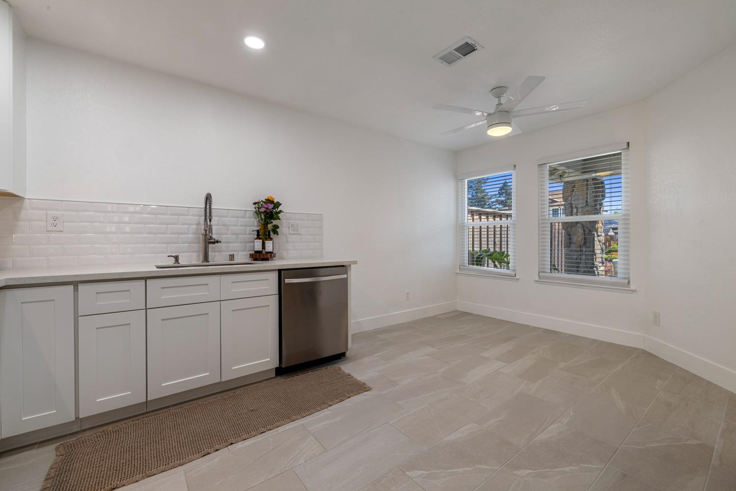 9488 Dunkerrin Way Elk Grove, CA 95758 - Photo 15 of 43 a kitchen with sink and cabinets