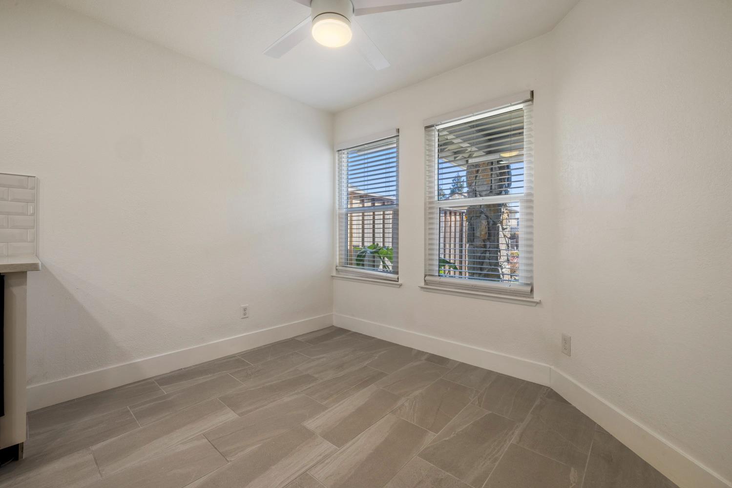 9488 Dunkerrin Way Elk Grove, CA 95758 - Photo 19 of 43 a view of an empty room with a window