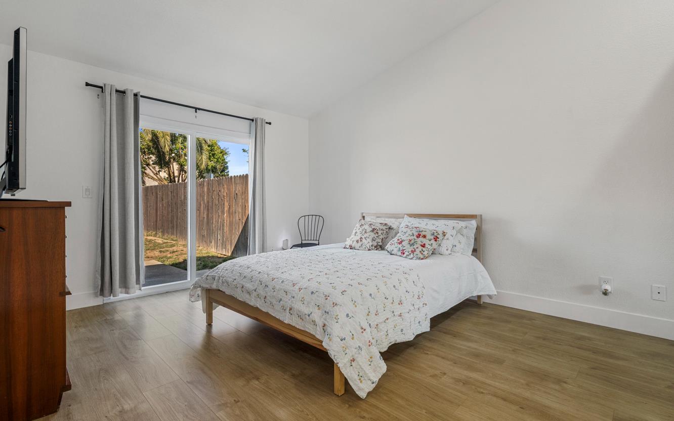 9488 Dunkerrin Way Elk Grove, CA 95758 - Photo 23 of 43 a bedroom with a bed and a window