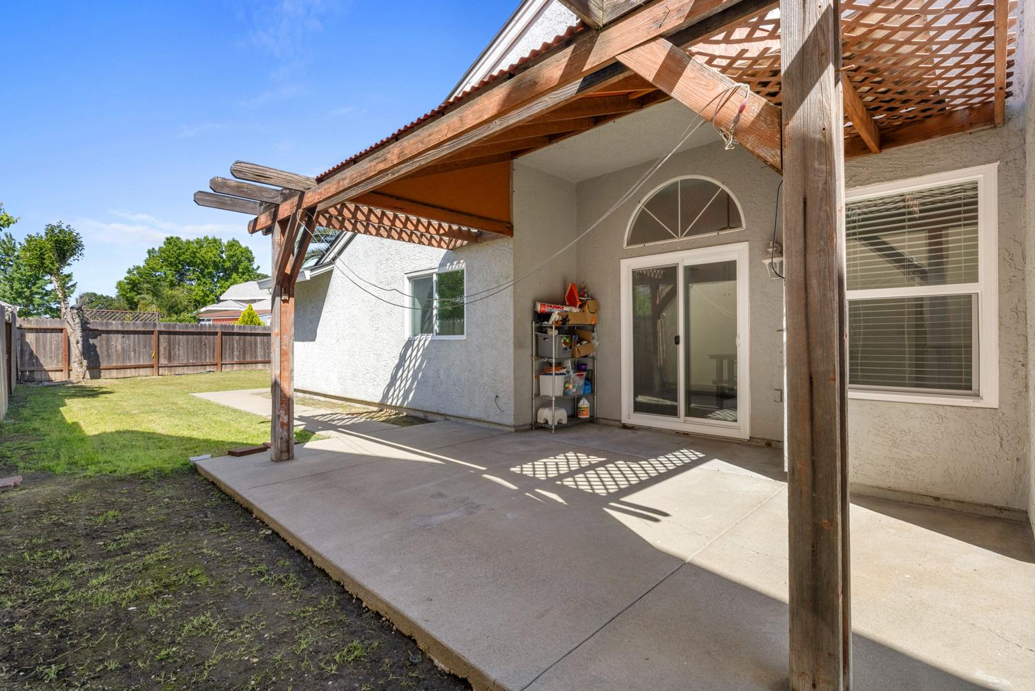 9488 Dunkerrin Way Elk Grove, CA 95758 - Photo 32 of 43 a view of a house with backyard