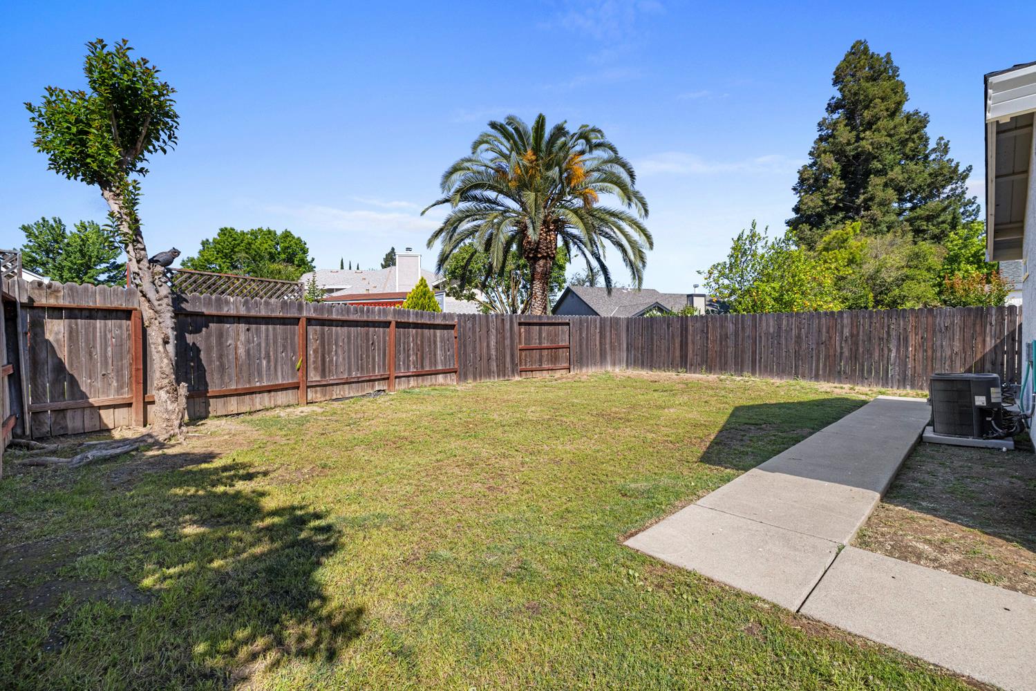 9488 Dunkerrin Way Elk Grove, CA 95758 - Photo 34 of 43 a house with swimming pool in front of it