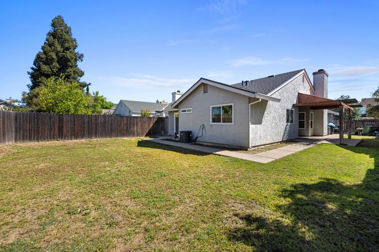 9488 Dunkerrin Way Elk Grove, CA 95758 - Photo 35 of 43 a view of a house with a yard