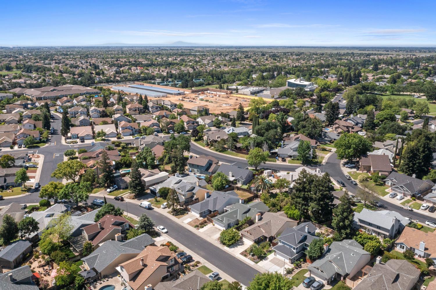 9488 Dunkerrin Way Elk Grove, CA 95758 - Photo 41 of 43 an aerial view of a city with lots of residential buildings