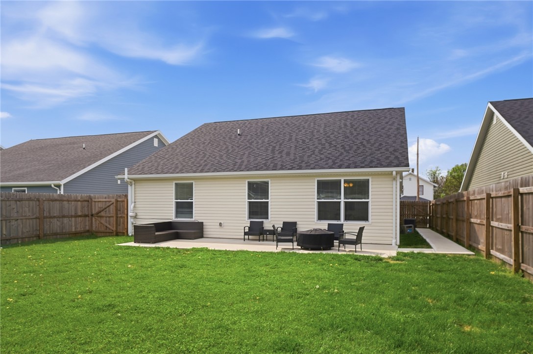 728 East Northern Avenue Springfield, OH 45503 - Photo 30 of 35 Enjoy outdoor living with a spacious yard and inviting patio area, perfect for gatherings.
