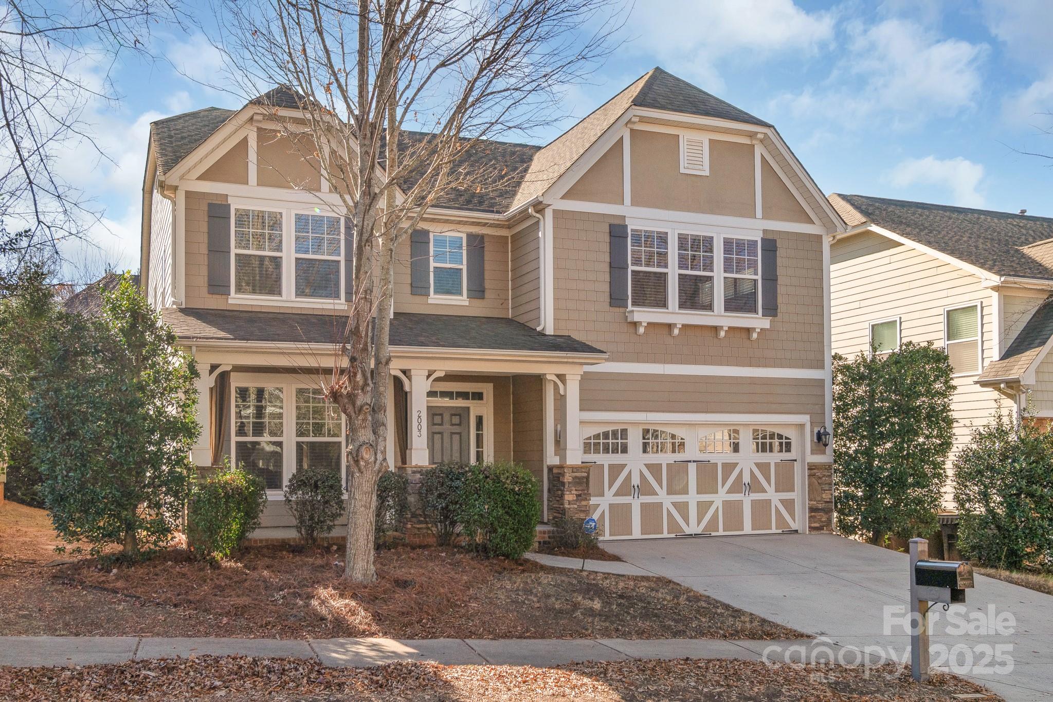 2003 Fallondale Road Waxhaw, NC 28173 - Photo 1 of 27 a front view of a house with a yard