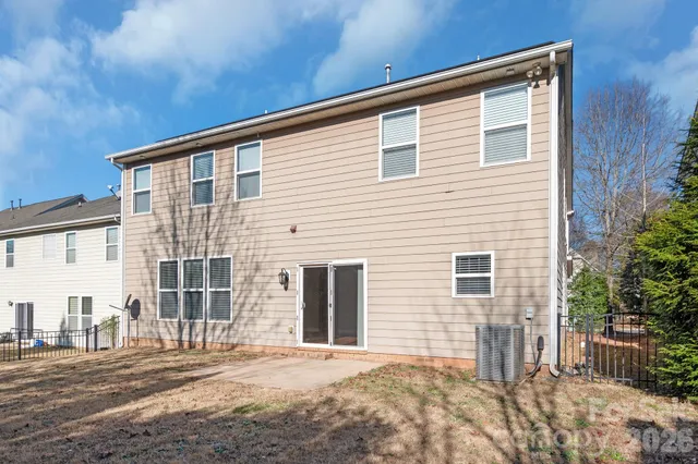 a front view of a house with a garage