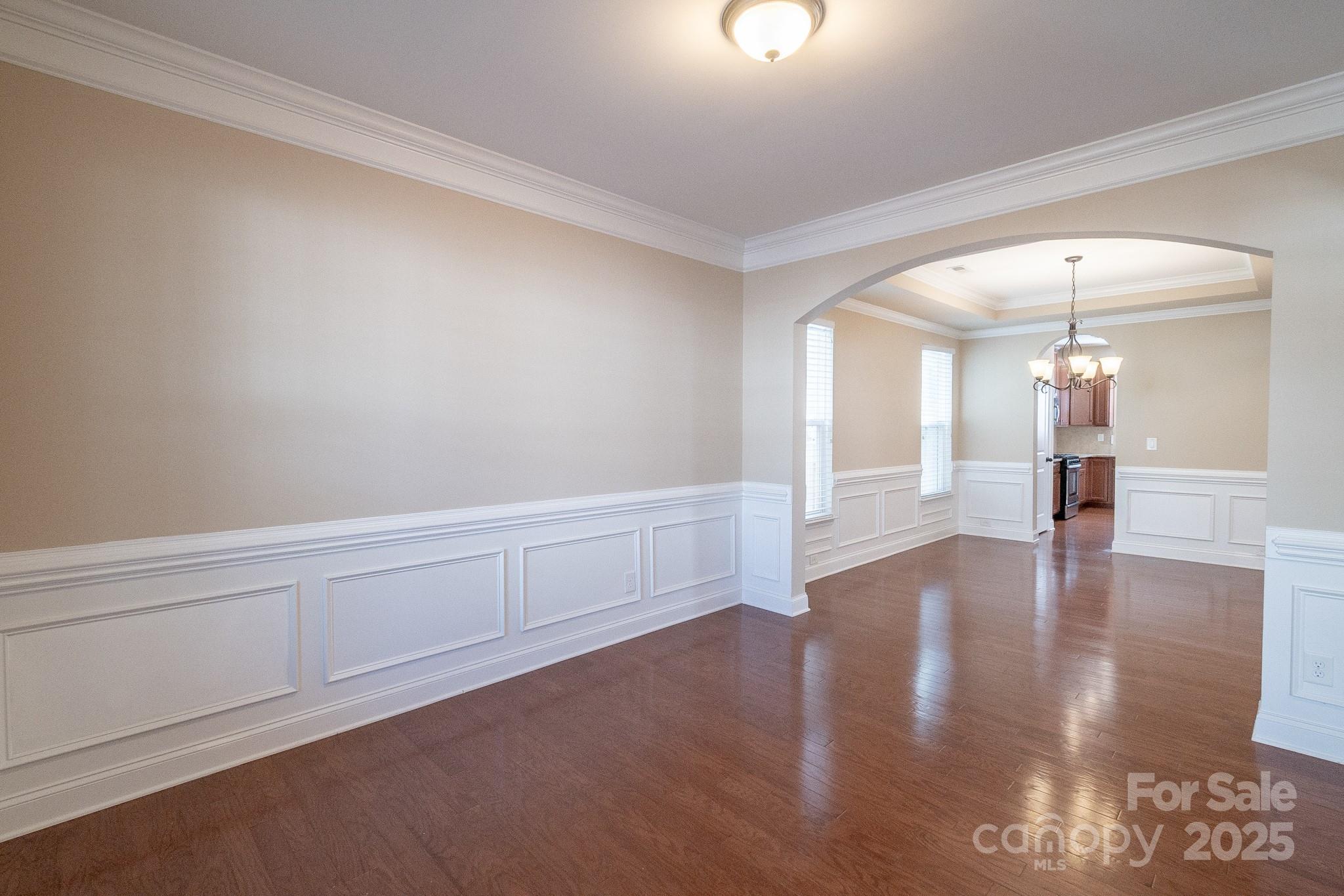 2003 Fallondale Road Waxhaw, NC 28173 - Photo 4 of 27 a view of an empty room and wooden floor
