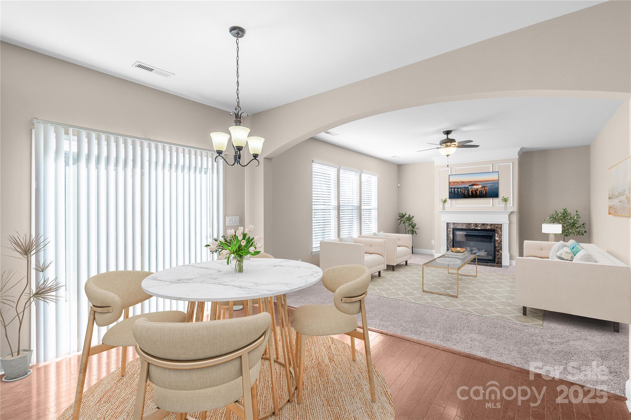 2003 Fallondale Road Waxhaw, NC 28173 - Photo 10 of 27 a living room with fireplace furniture and a chandelier