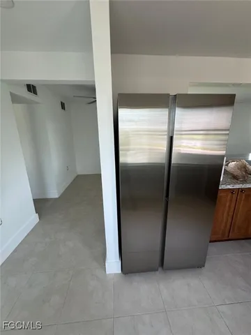 a bathroom with a shower and a toilet