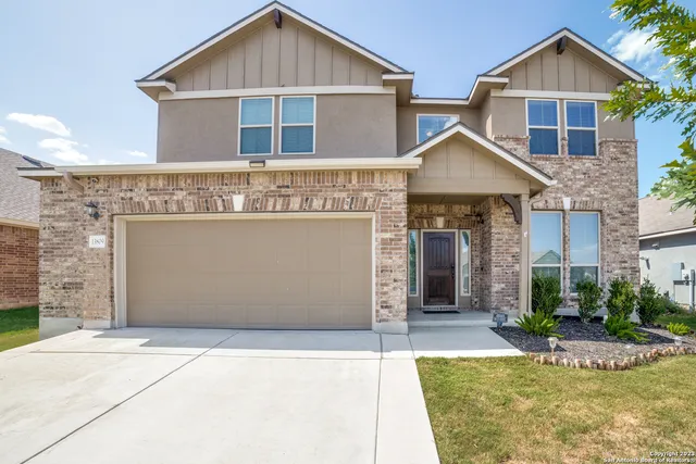 a view of a house with garage