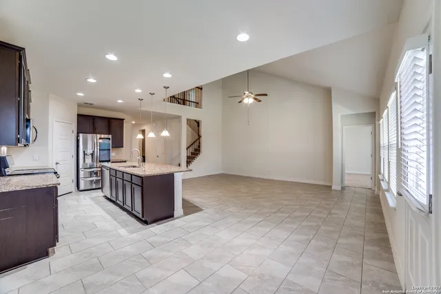 a view of a kitchen with furniture and a kitchen