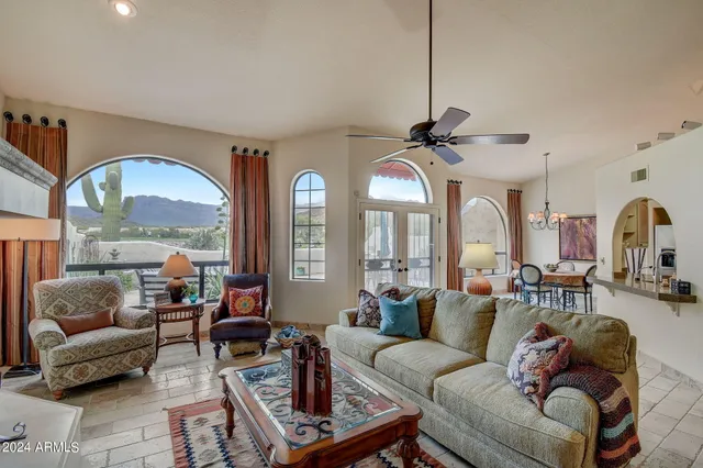 a very nice looking dining room with a table and chairs