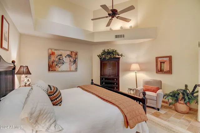 a view of a bathroom with a tub and shower