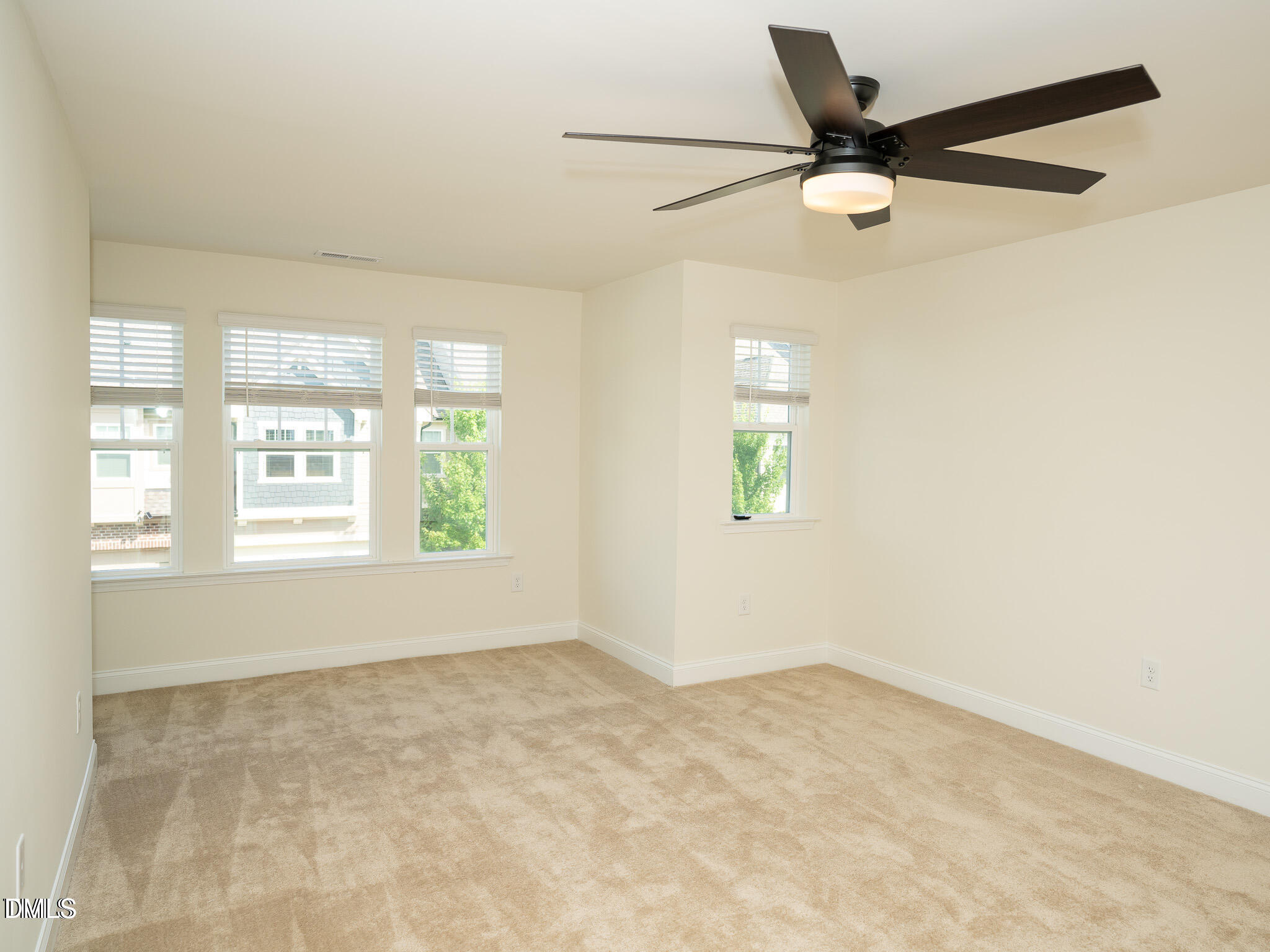 647 Newlyn Drive Raleigh, NC 27606 - Photo 37 of 52 a view of an empty room with a window