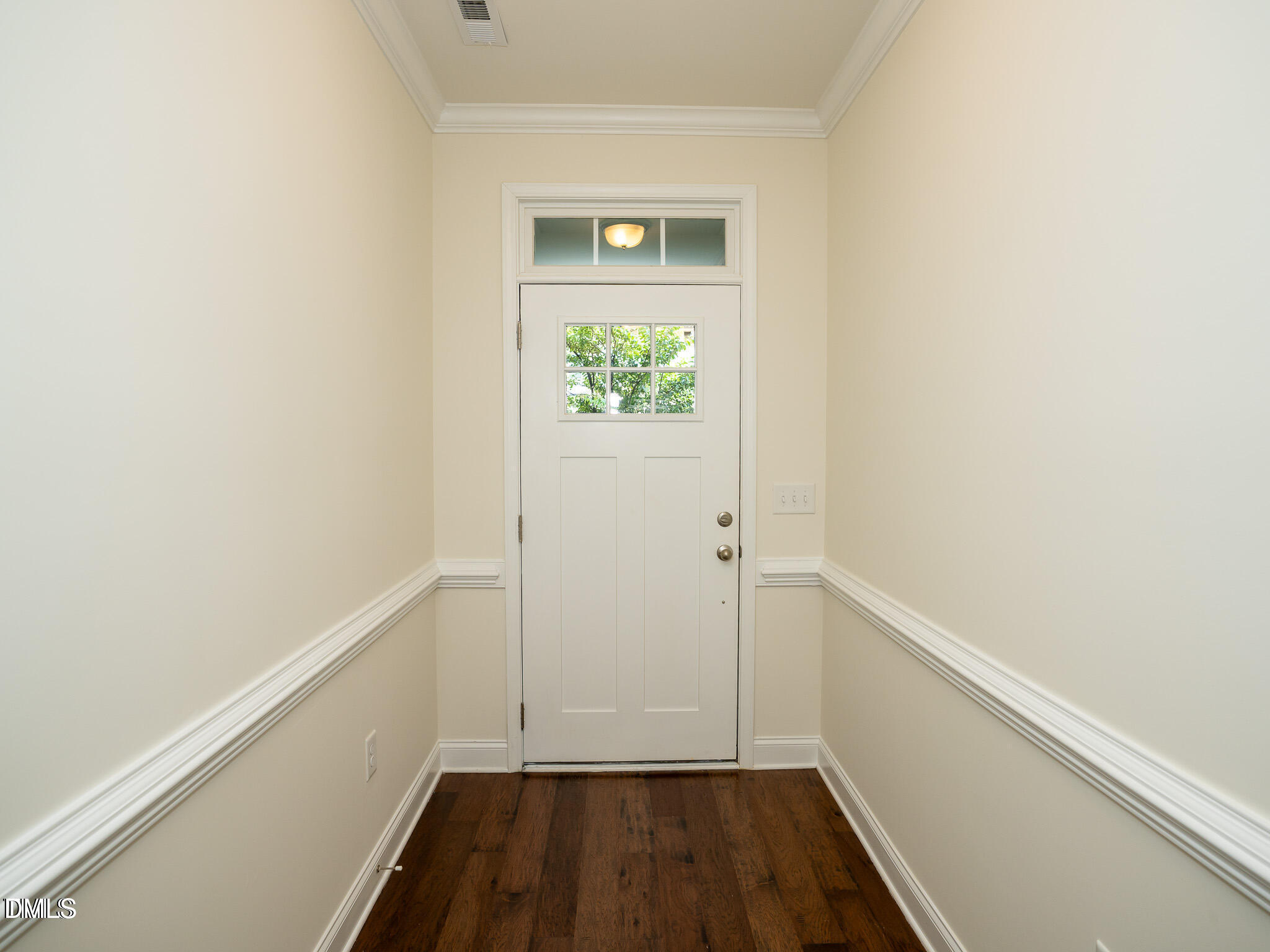 647 Newlyn Drive Raleigh, NC 27606 - Photo 4 of 52 a small space with wooden floor and a window