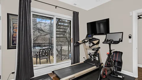 a view of a room with gym equipment