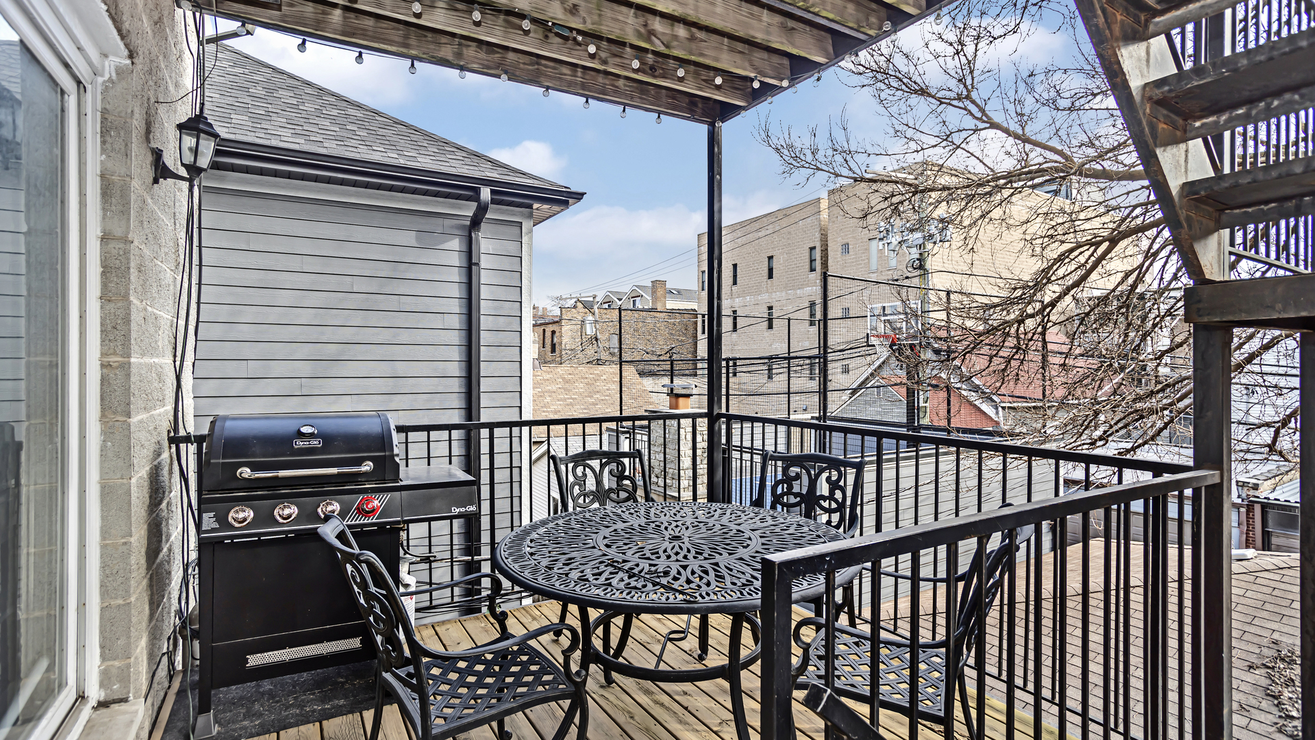 1131 West Wolfram Street, Unit 2 Chicago, IL 60657 - Photo 14 of 15 a view of a balcony with chairs
