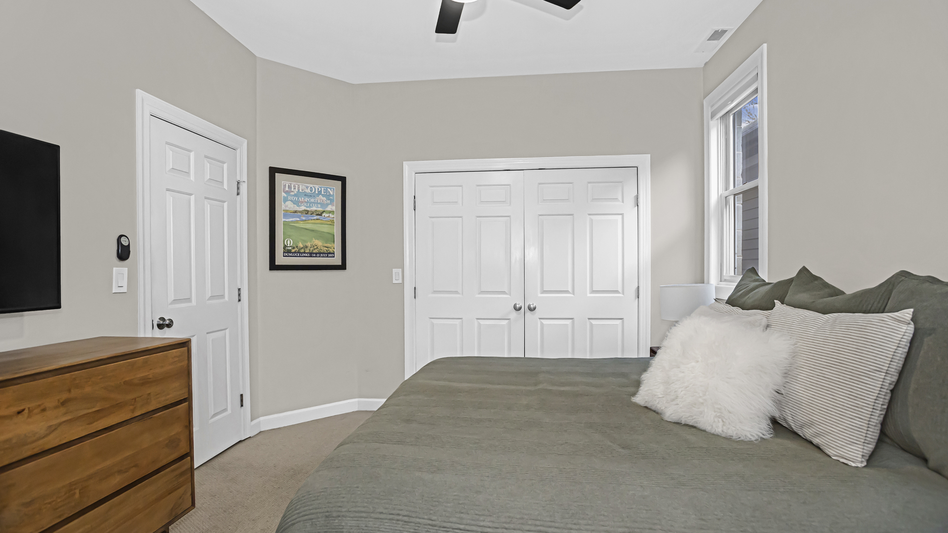 1131 West Wolfram Street, Unit 2 Chicago, IL 60657 - Photo 9 of 15 a bedroom with a bed and a window