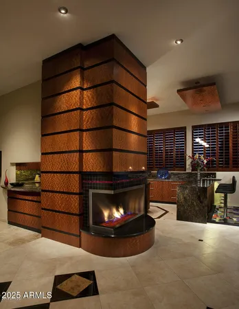 a room with furniture and a fireplace