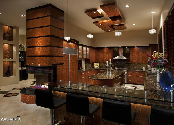 a room with lots of appliances and furniture