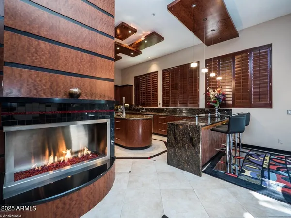 a view of a living room and kitchen