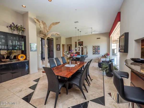 a view of a dining room with furniture
