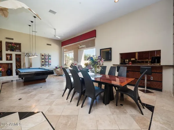 a view of a dining room with furniture