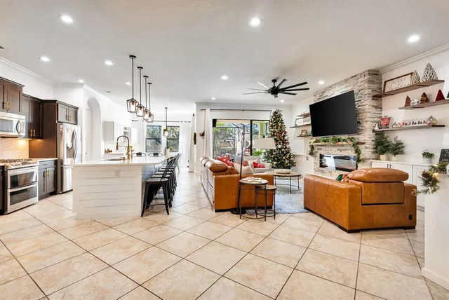 a bedroom with a bed and a dresser in it