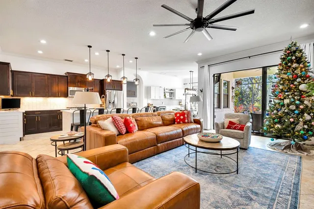 a bedroom with a bed and a television