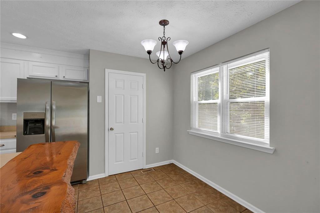 281 Cedars Glen Circle Villa Rica, GA 30180 - Photo 12 of 52 a view of an empty room with a window
