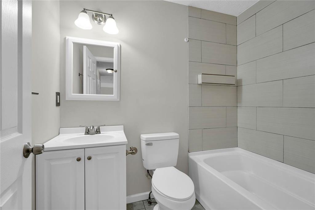 281 Cedars Glen Circle Villa Rica, GA 30180 - Photo 26 of 52 a white toilet sitting next to a white tub