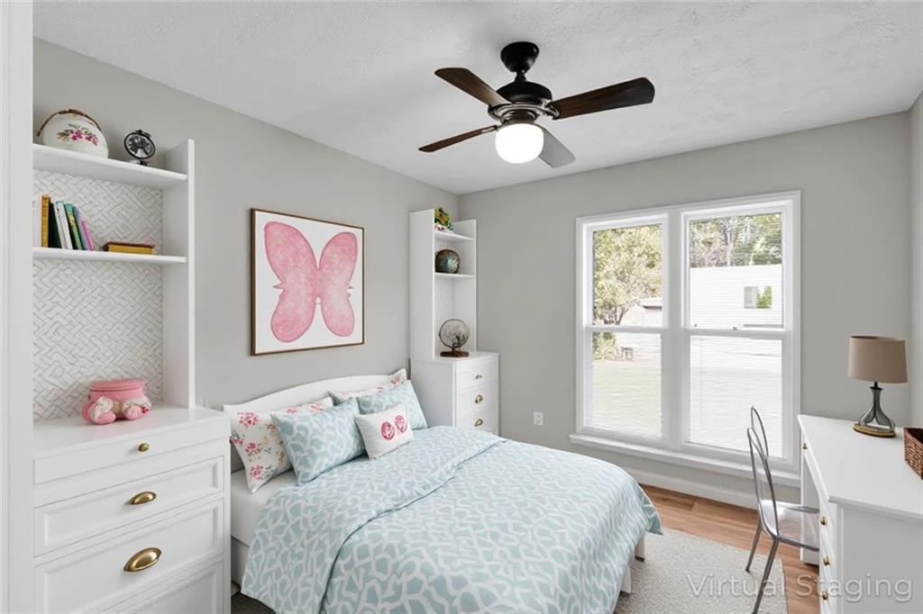 281 Cedars Glen Circle Villa Rica, GA 30180 - Photo 30 of 52 a bedroom with a bed and a window