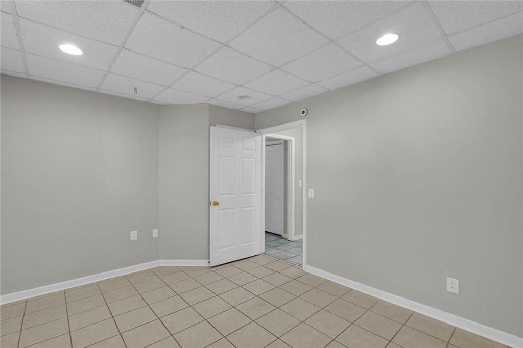 281 Cedars Glen Circle Villa Rica, GA 30180 - Photo 35 of 52 an empty room with white walls