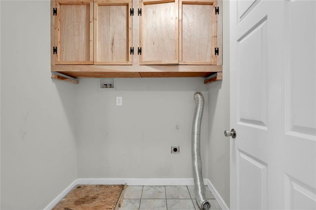 281 Cedars Glen Circle Villa Rica, GA 30180 - Photo 36 of 52 a bathroom with granite countertop cabinets and a sink