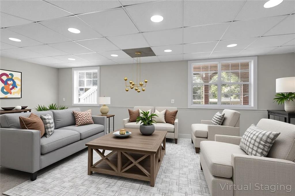 281 Cedars Glen Circle Villa Rica, GA 30180 - Photo 37 of 52 a living room with furniture and a large window