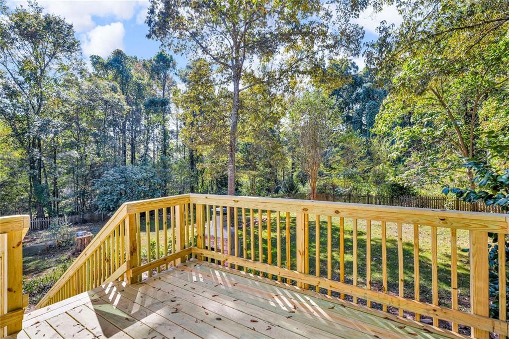 281 Cedars Glen Circle Villa Rica, GA 30180 - Photo 49 of 52 a view of a wooden chairs and a small deck