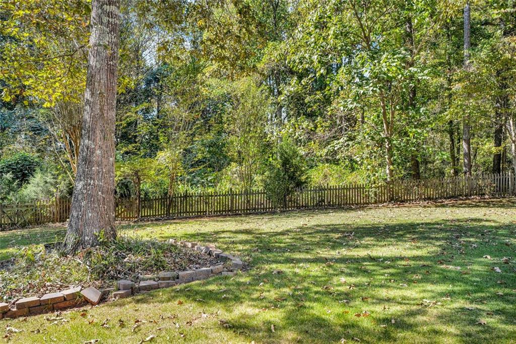 281 Cedars Glen Circle Villa Rica, GA 30180 - Photo 52 of 52 a view of a field with a tree