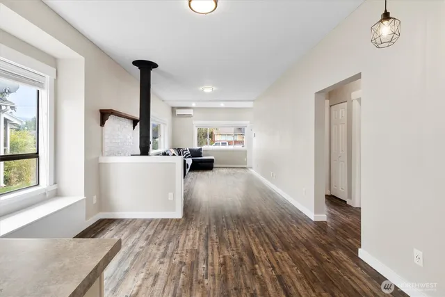a view of living room with furniture and window
