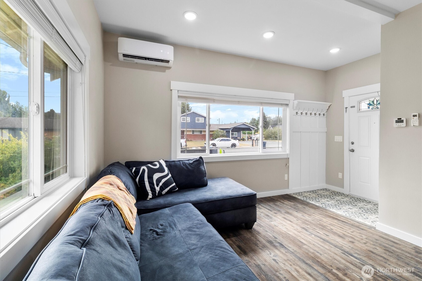 310 Second Street Sumas, WA 98295 - Photo 5 of 28 a living room with a couch and a large window