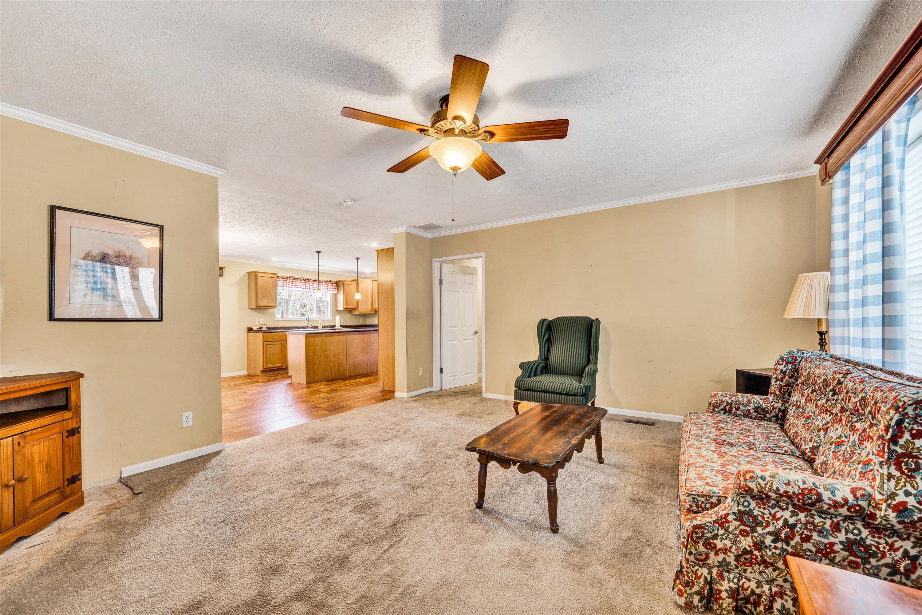 590 Belcher Road Penhook, VA 24137 - Photo 3 of 23 a living room with furniture and a window