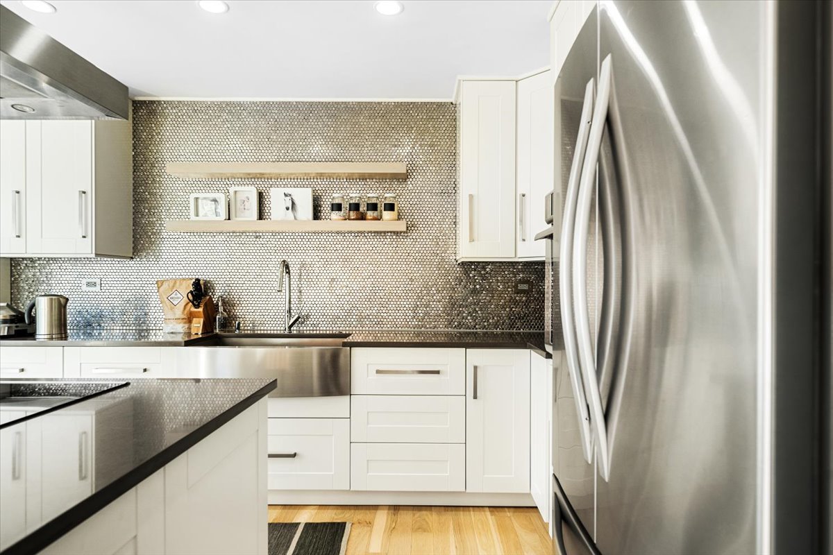 768 High Ridge Road Roselle, IL 60172 - Photo 5 of 46 a kitchen with stainless steel appliances granite countertop a refrigerator and a sink